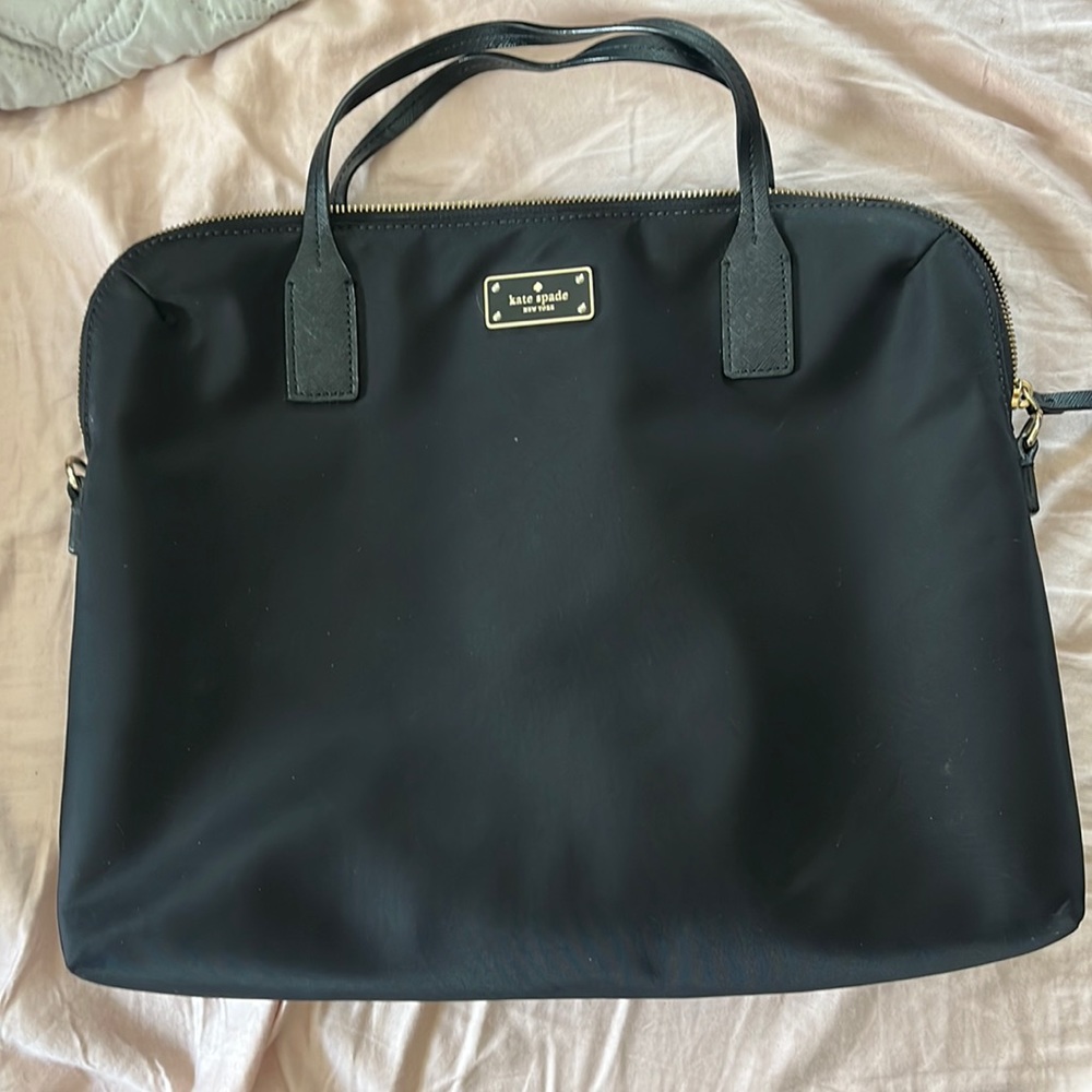 Black Kate spade laptop case.